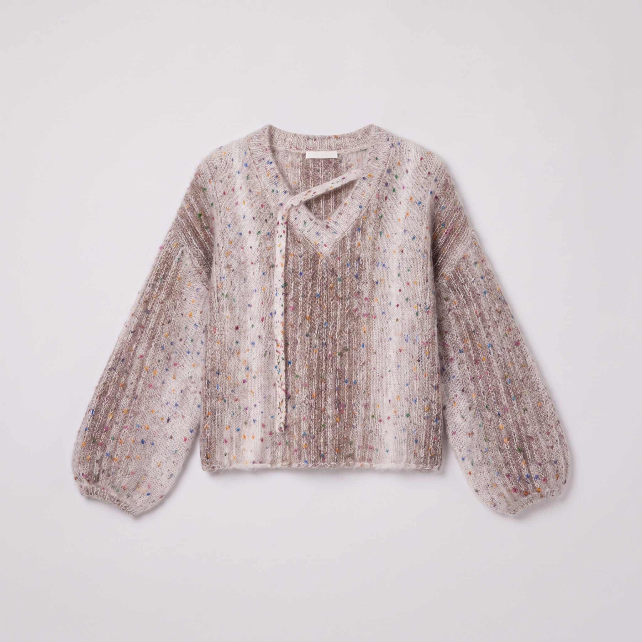 Nerissa speckled knit sweater in oatmeal, flat lay showing the asymmetric V-neck placket