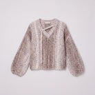 Nerissa speckled knit sweater in oatmeal, flat lay showing the asymmetric V-neck placket