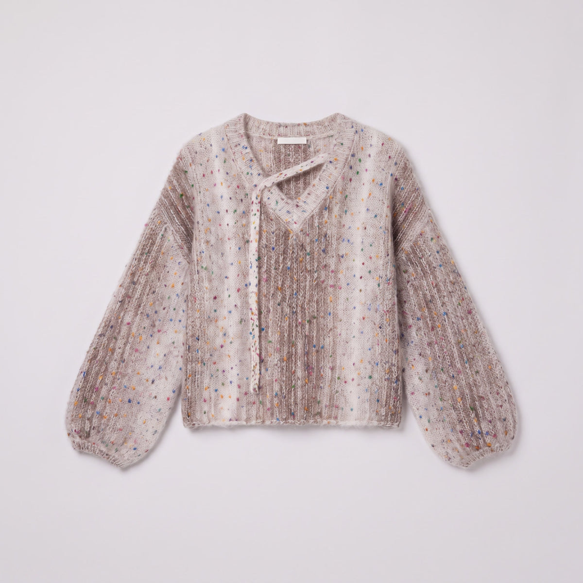 Nerissa speckled knit sweater in oatmeal, flat lay showing the asymmetric V-neck placket