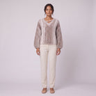 Nerissa speckled knit sweater in oatmeal with confetti flecks, front view on model