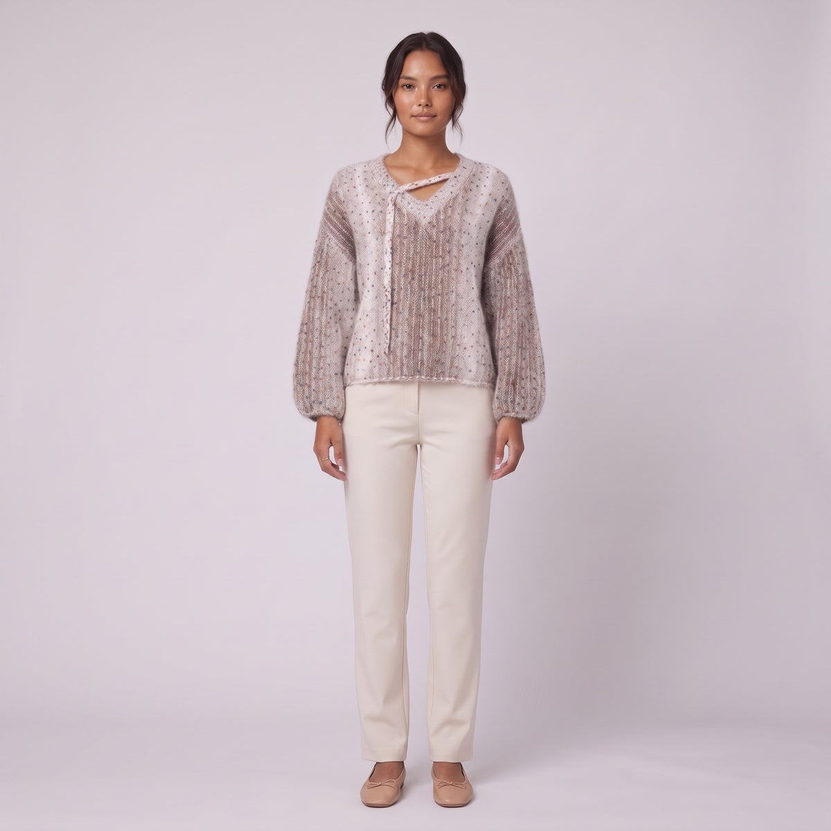 Nerissa speckled knit sweater in oatmeal with confetti flecks, front view on model