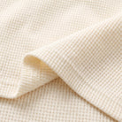 Ninon lounge set, close-up of the cream waffle knit fabric