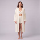 Ninon waffle lounge set in cream with wrap robe, shorts and bralette, front view on model