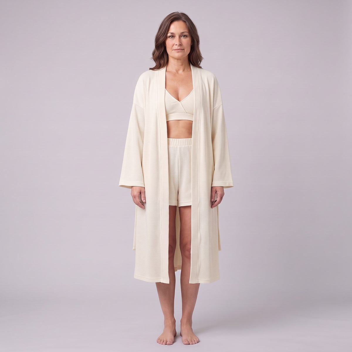 Ninon waffle lounge set in cream with wrap robe, shorts and bralette, front view on model