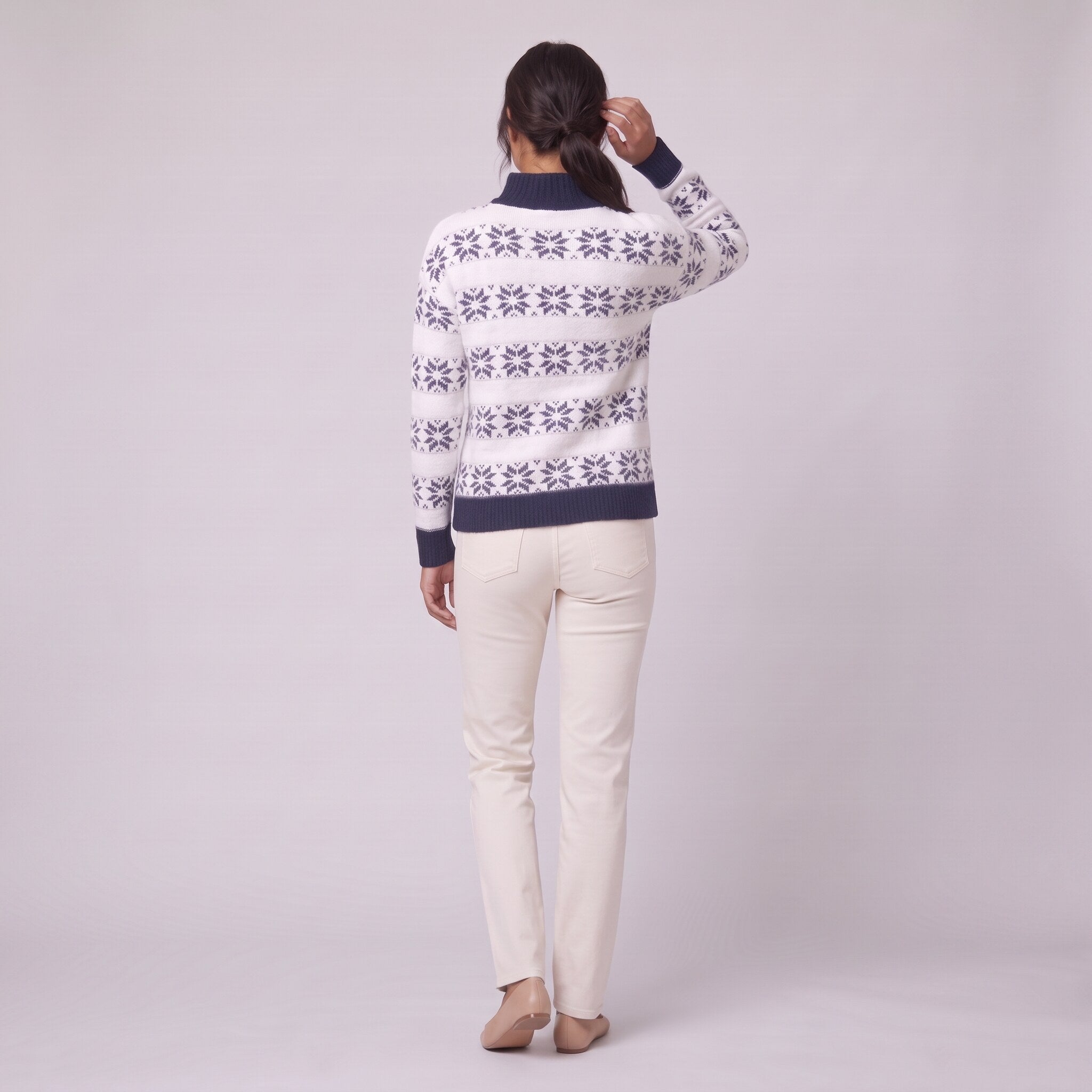 Nova snowflake knit sweater in navy blue, back view on model