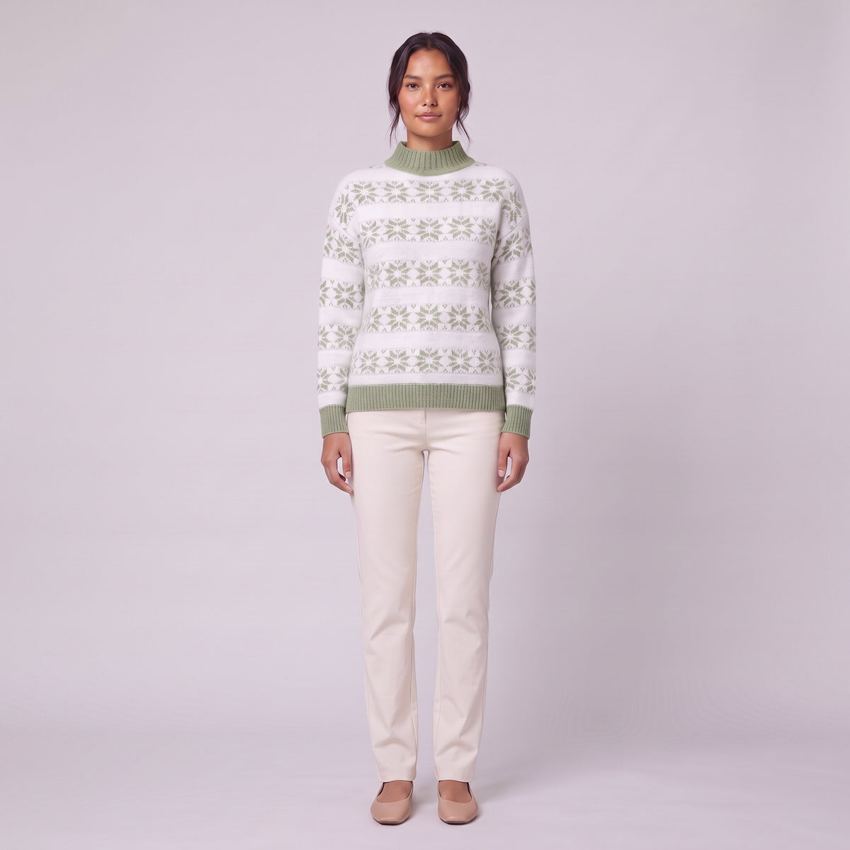 Nova snowflake knit sweater in sage green, front view on model