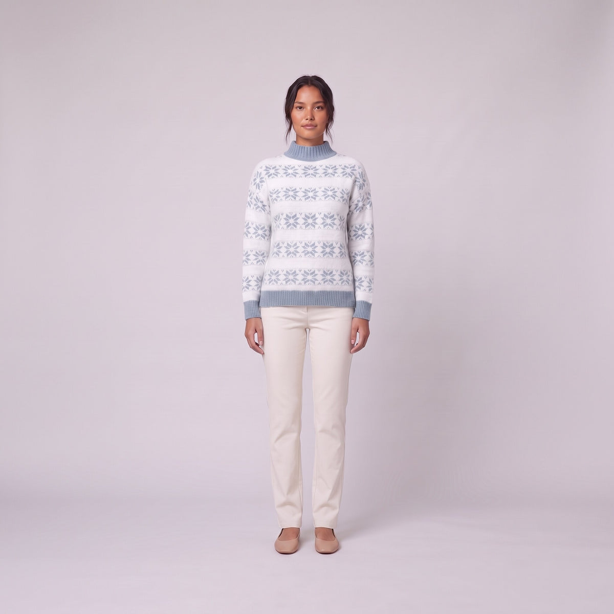 Nova snowflake knit sweater in light powder blue, front view on model