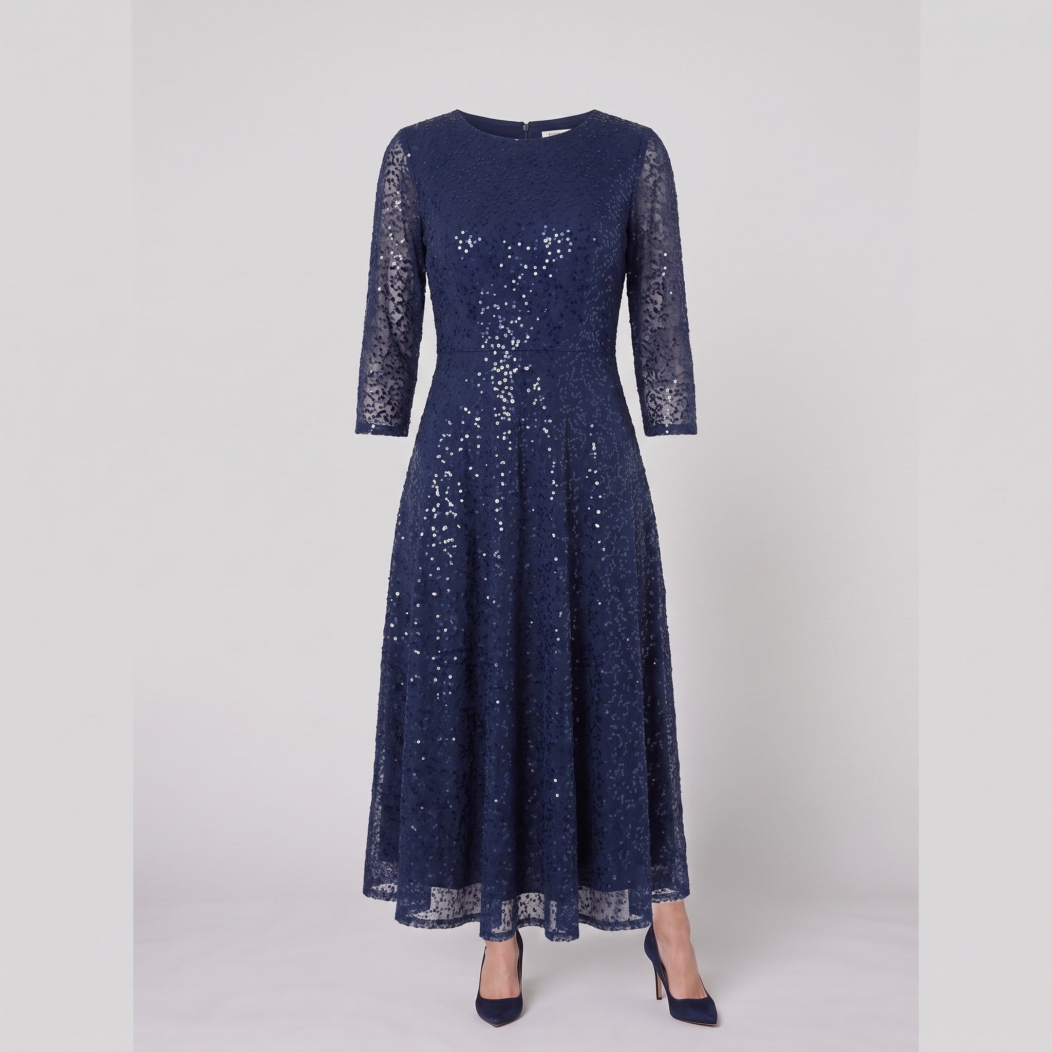 Novara navy sequin dress shown without a model on a light grey background