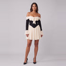 Odette off-shoulder corset mini dress in black with a cream bow at the bust, front view