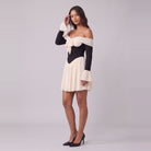 Odette corset mini dress, three-quarter view showing the gathered skirt