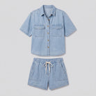Sky blue pyjama set, top and shorts flat lay