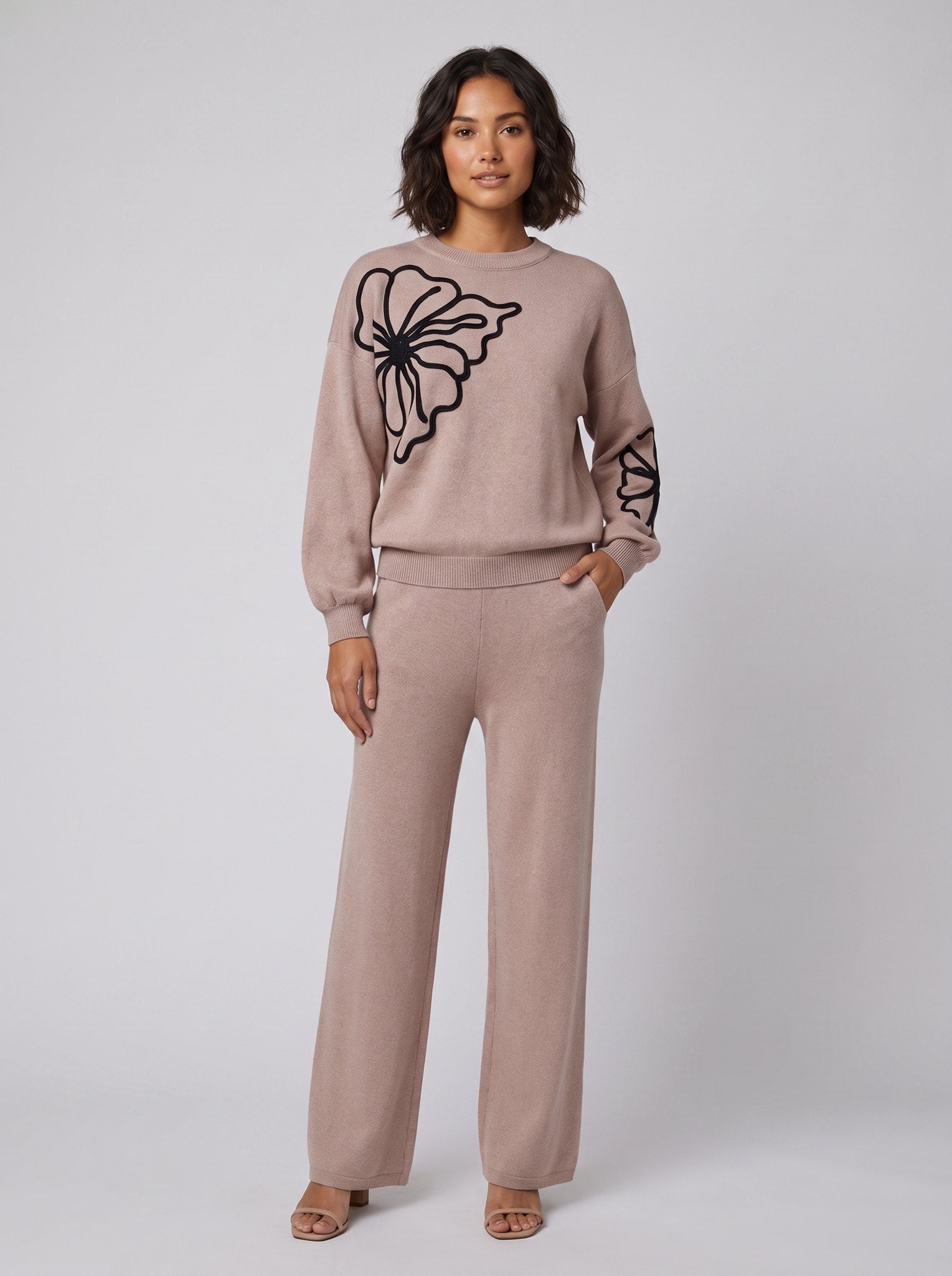 Knit lounge co-ord with a floral outline pattern and wide leg trousers, view 1
