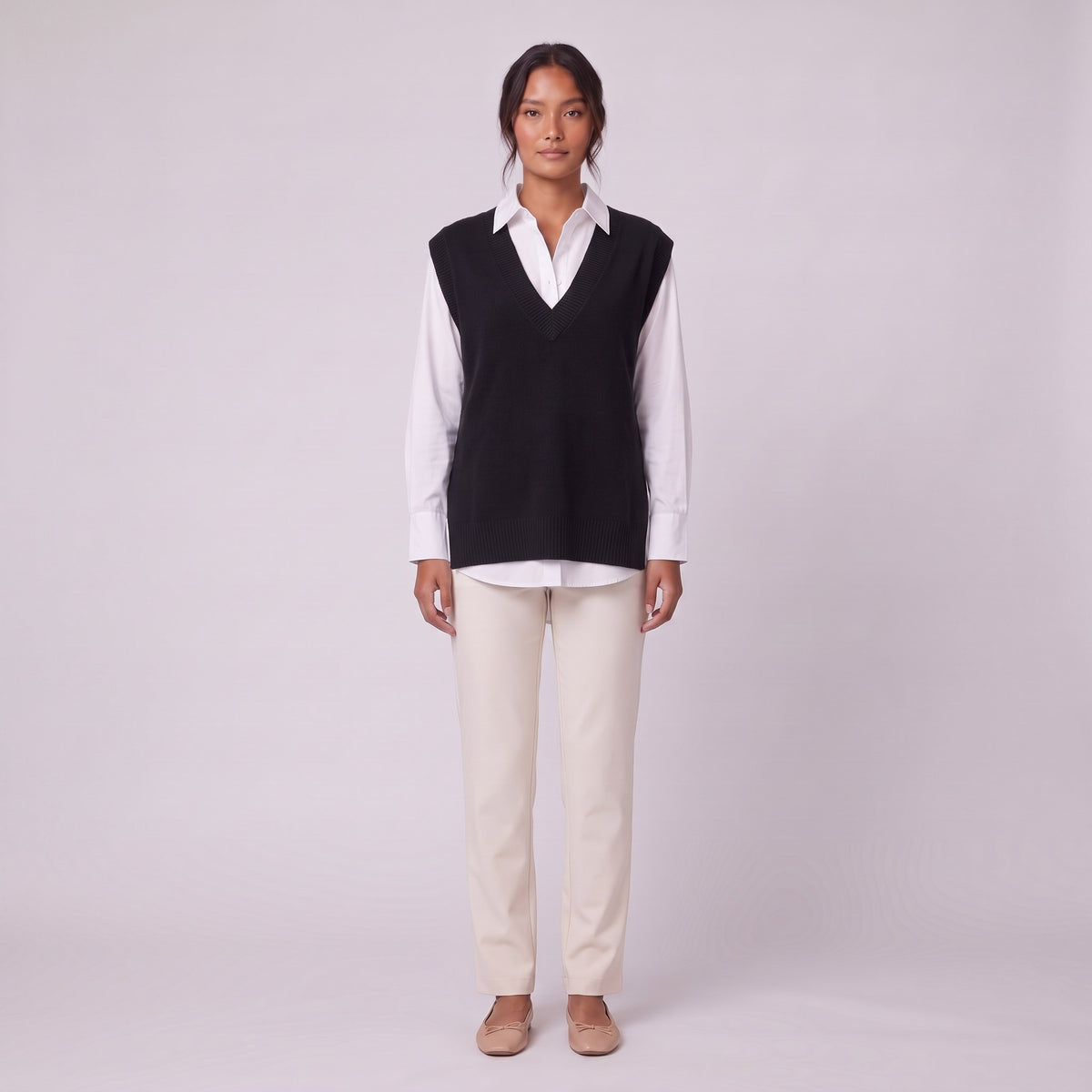 Roxane knit vest in black, front view on model
