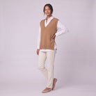 Roxane knit vest in camel brown, three-quarter view showing the side slits