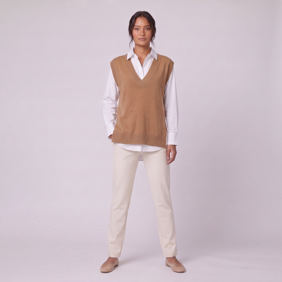 Roxane knit vest in camel brown, full front view showing the V-neck and relaxed fit