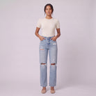 Savona distressed jeans in light wash, full-length view with hands in pockets