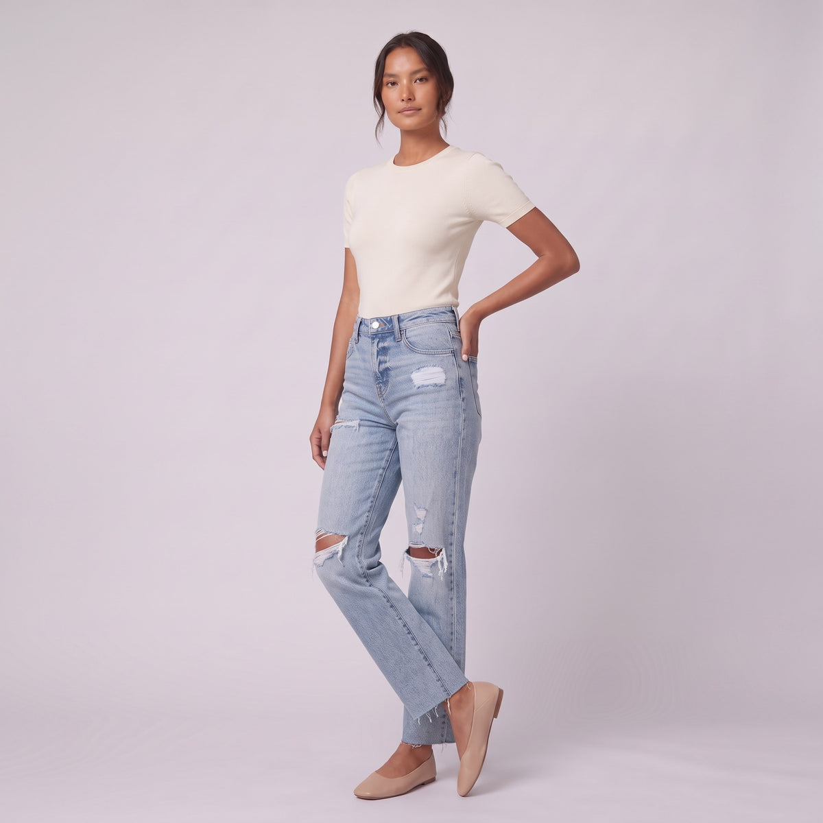 Savona distressed jeans in light wash, three-quarter view showing straight leg