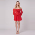 Scarlet Muse red off-shoulder mini dress, standing view