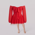 Scarlet Muse red mini dress shown without a model on a light grey background