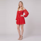 Scarlet Muse red mini dress, three-quarter view showing the balloon sleeves