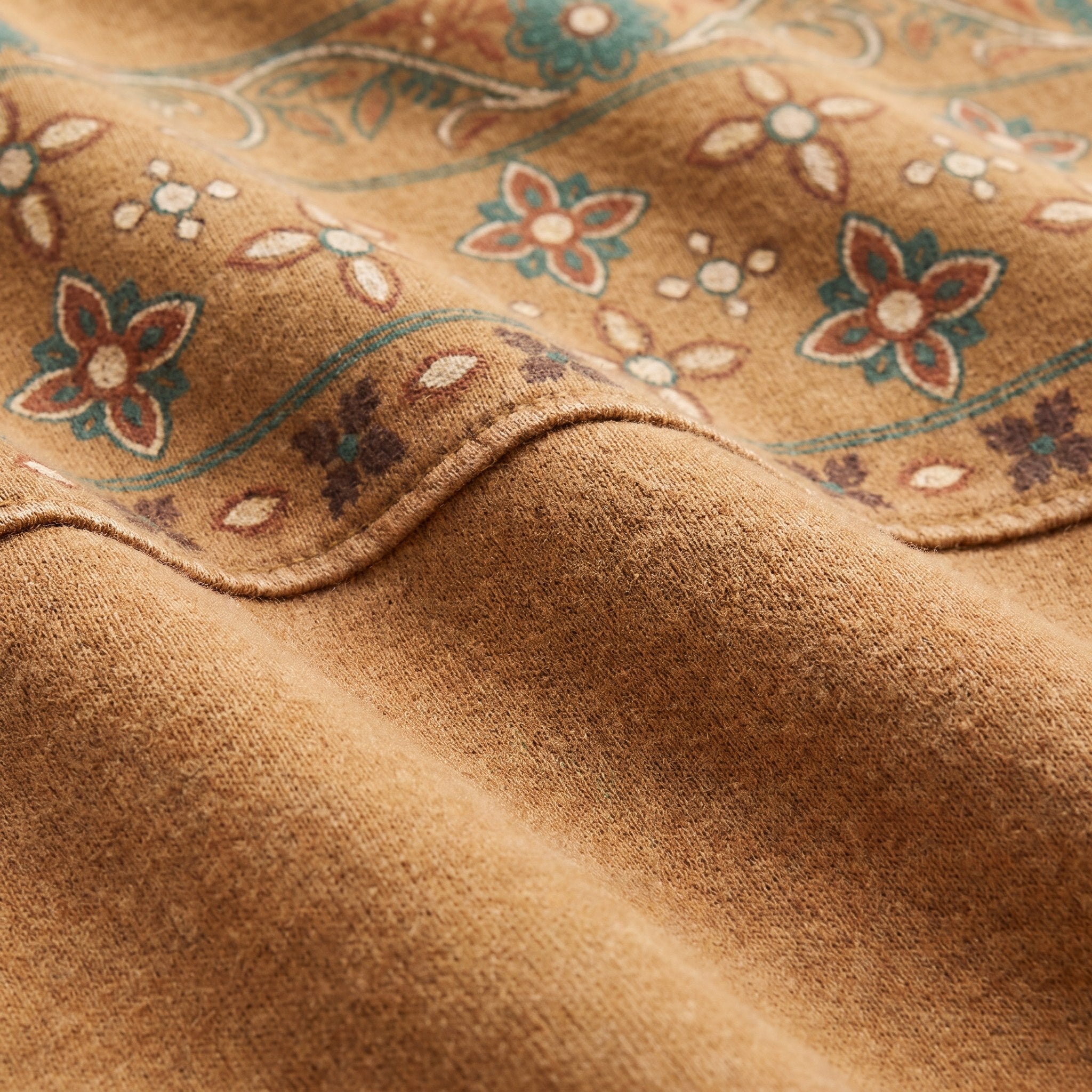 Sedona printed sweatshirt in caramel, close-up of the vintage-washed cotton blend and print