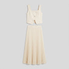 Apricot co-ord set flat lay, cropped button top and pleated maxi skirt