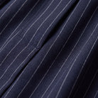 Sidony pinstripe trousers fabric detail, navy weave with fine white pinstripes