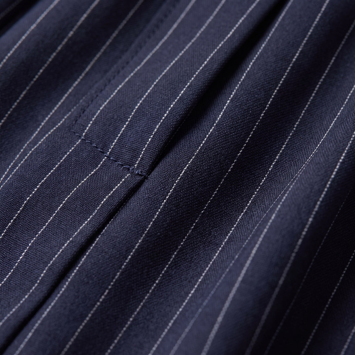 Sidony pinstripe trousers fabric detail, navy weave with fine white pinstripes