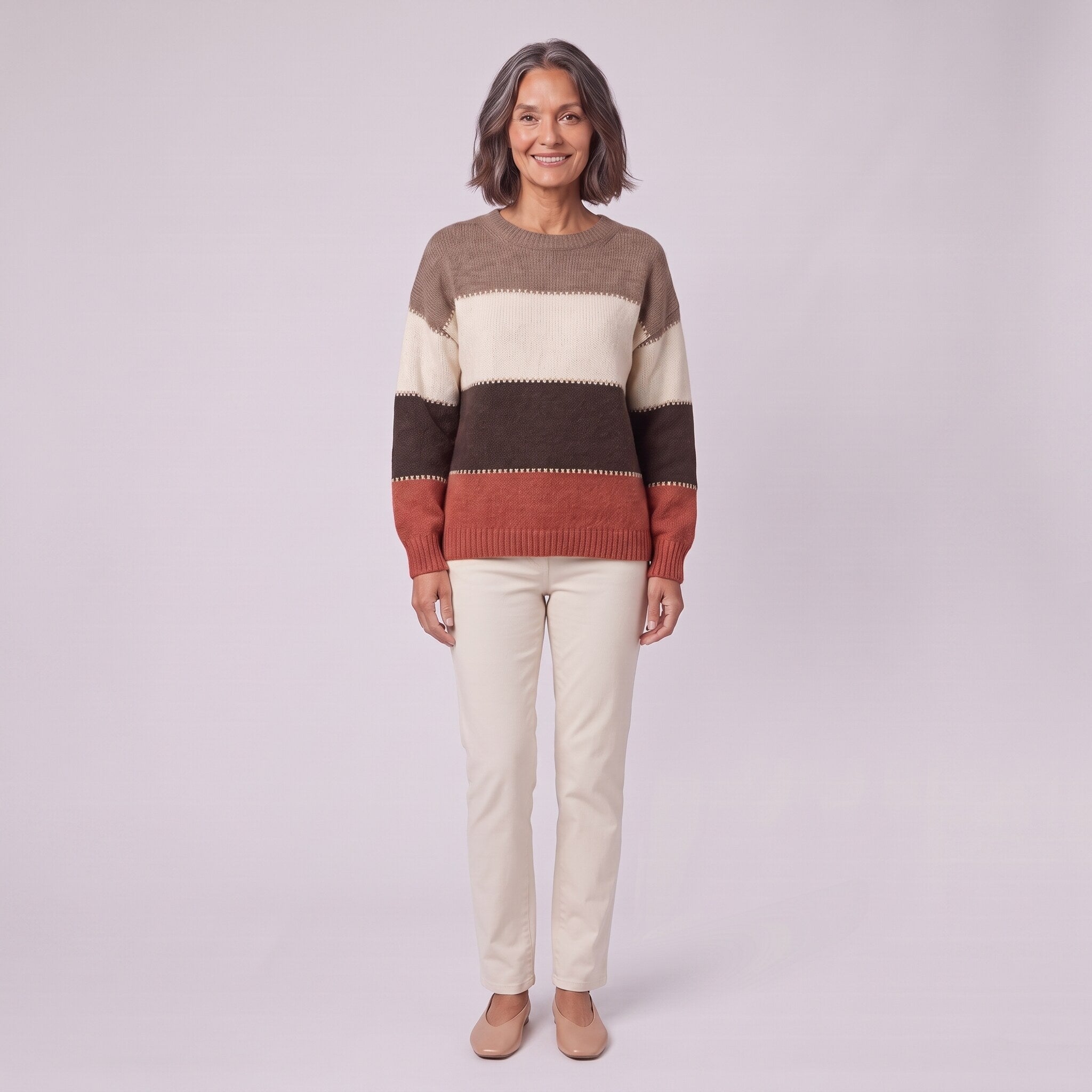 Sigrid colour block wool blend sweater, front view on model with cream trousers