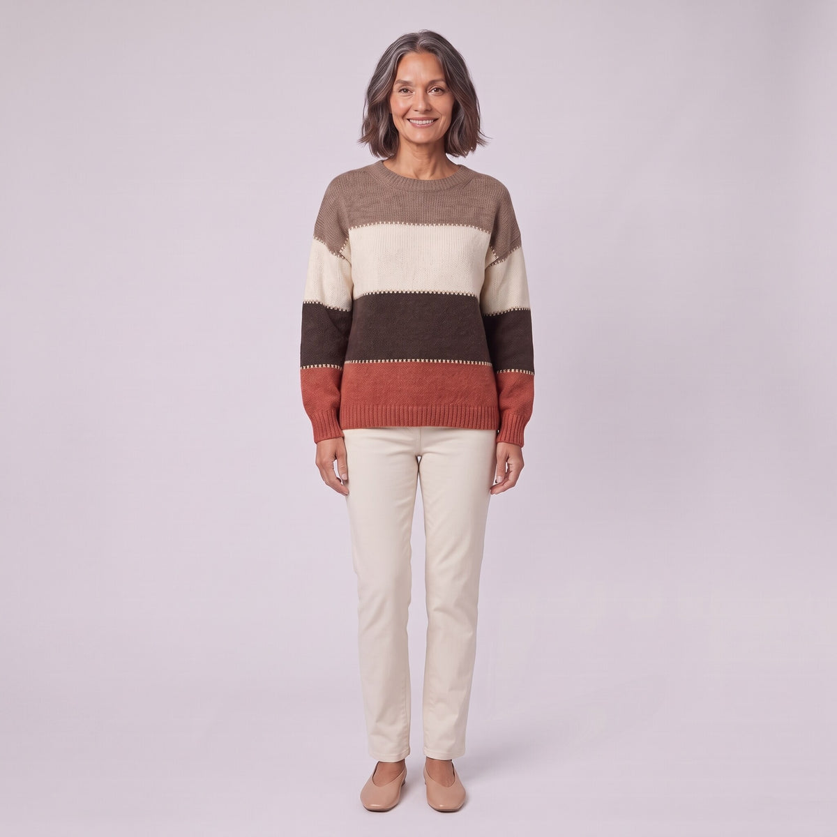 Sigrid colour block wool blend sweater, front view on model with cream trousers