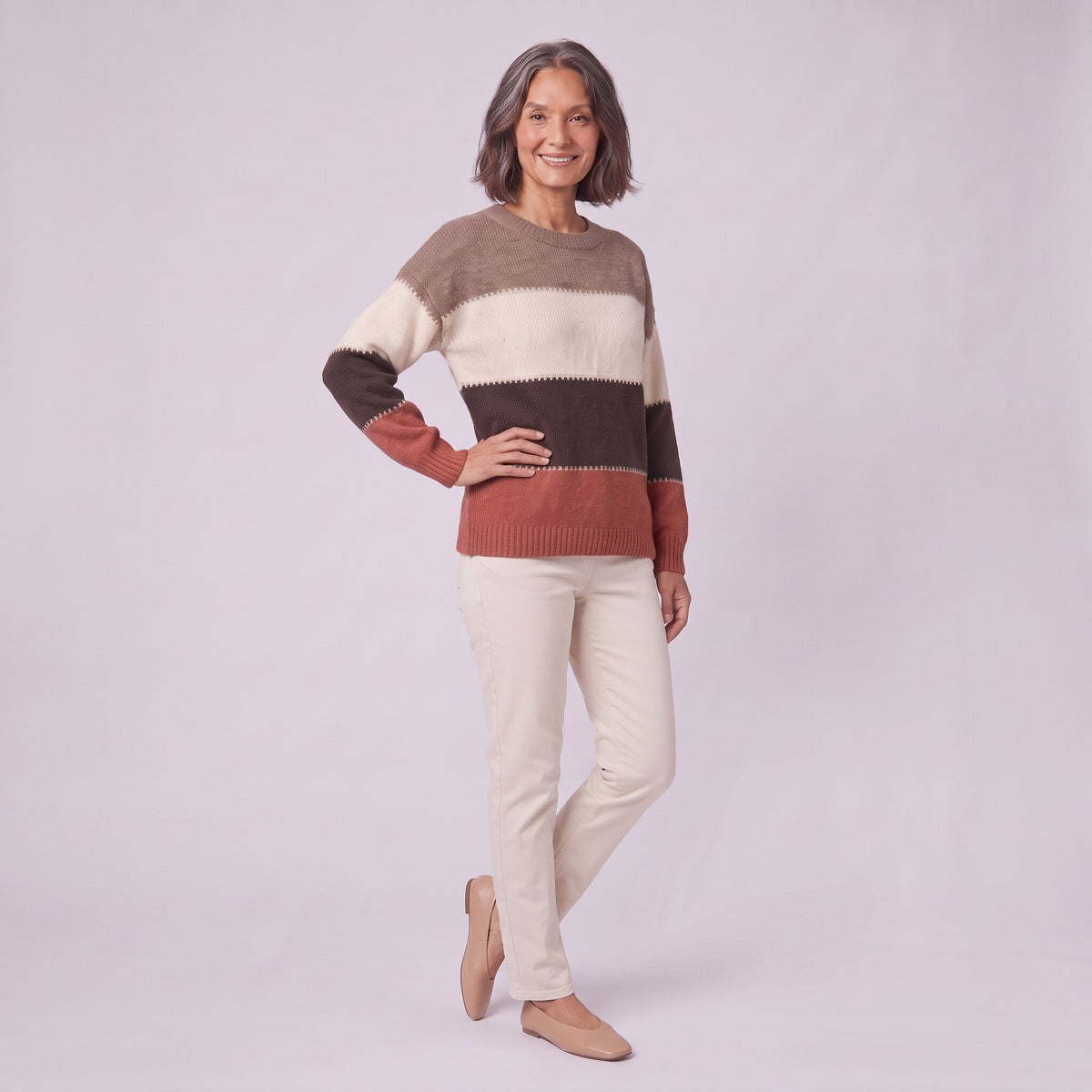 Sigrid colour block sweater, three quarter view showing blanket stitch detail