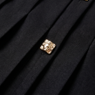 Black sleeveless mini dress with a pleated skirt and gold buttons, view 6