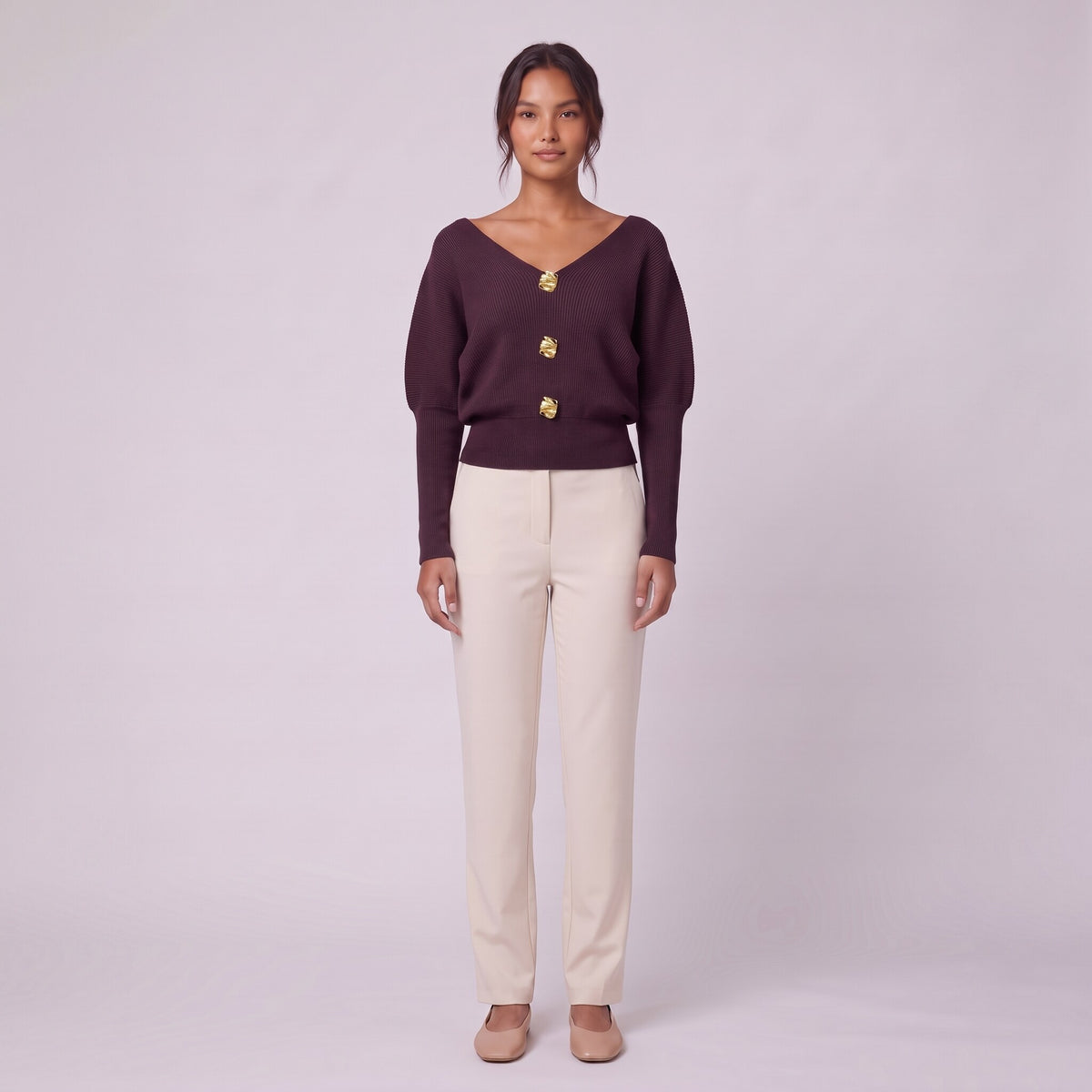 Solenne boat neck sweater with gold buttons in deep burgundy red, front view on model