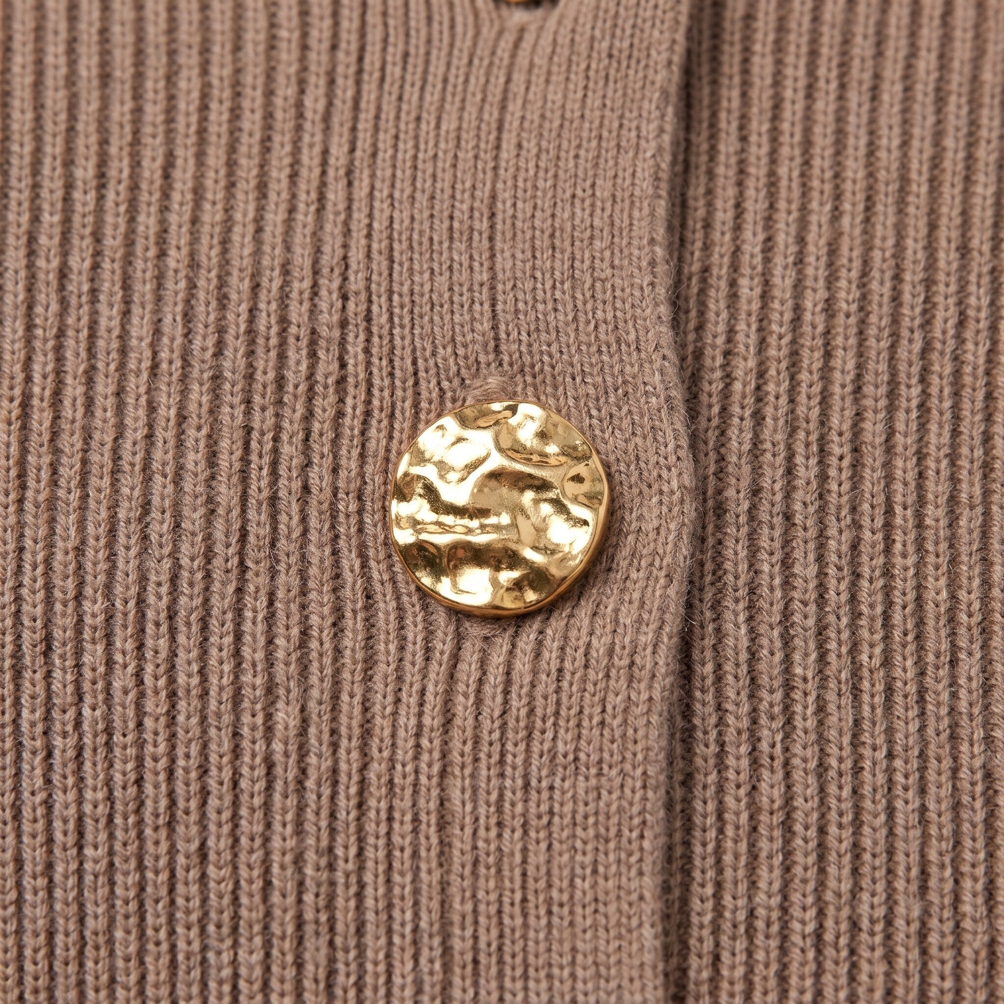 Solenne sweater fabric detail, taupe rib knit with ornate gold button