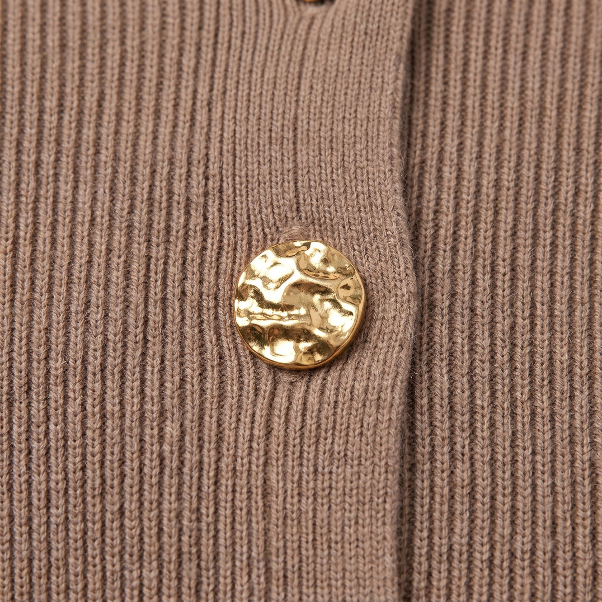 Solenne sweater fabric detail, taupe rib knit with ornate gold button