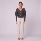 Solenne boat neck sweater with gold buttons in charcoal grey, front view on model