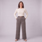 Sunniva check wide leg trousers in grey, full-length view with hands in pockets