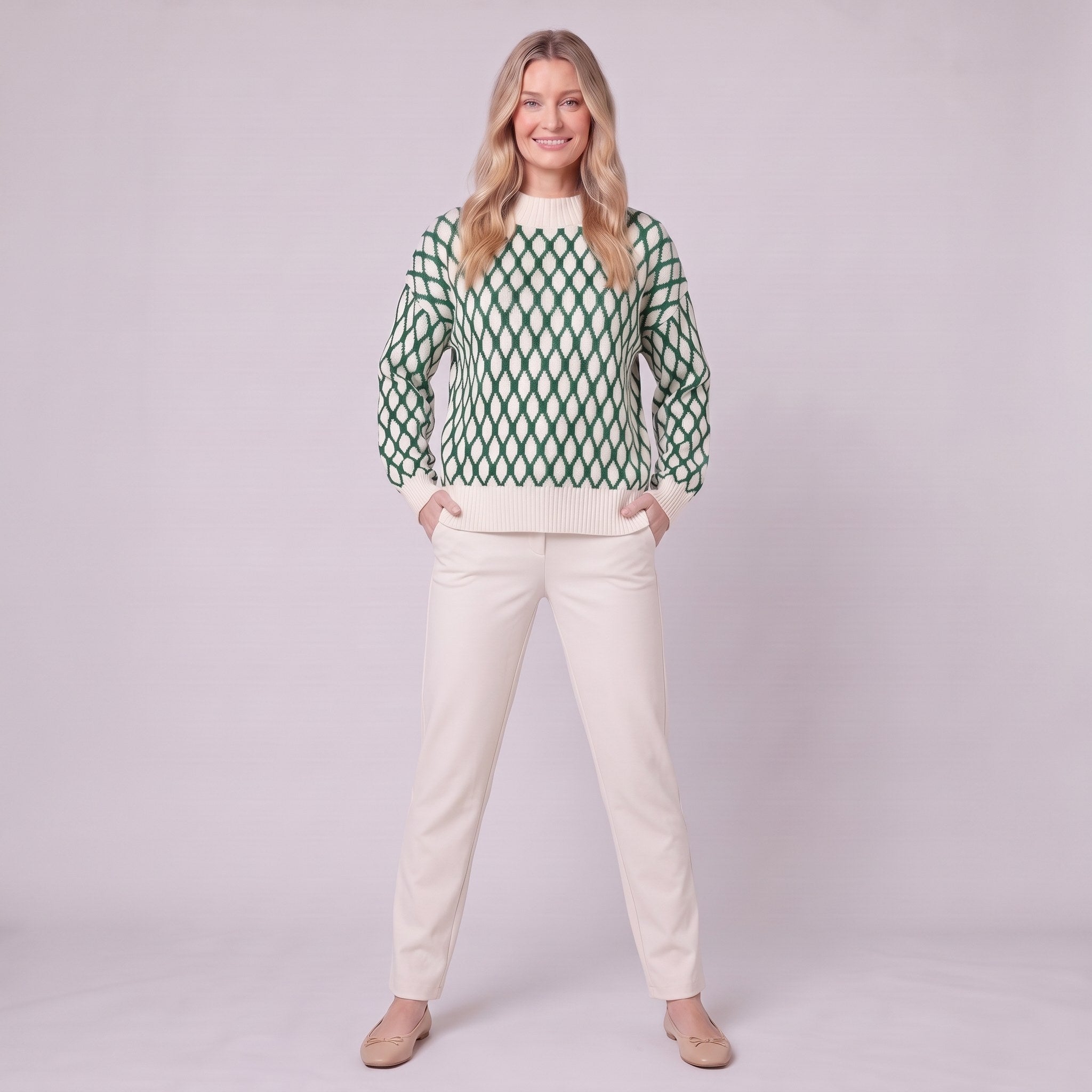Zinnia lattice knit sweater in emerald green, full front view showing the oversized fit