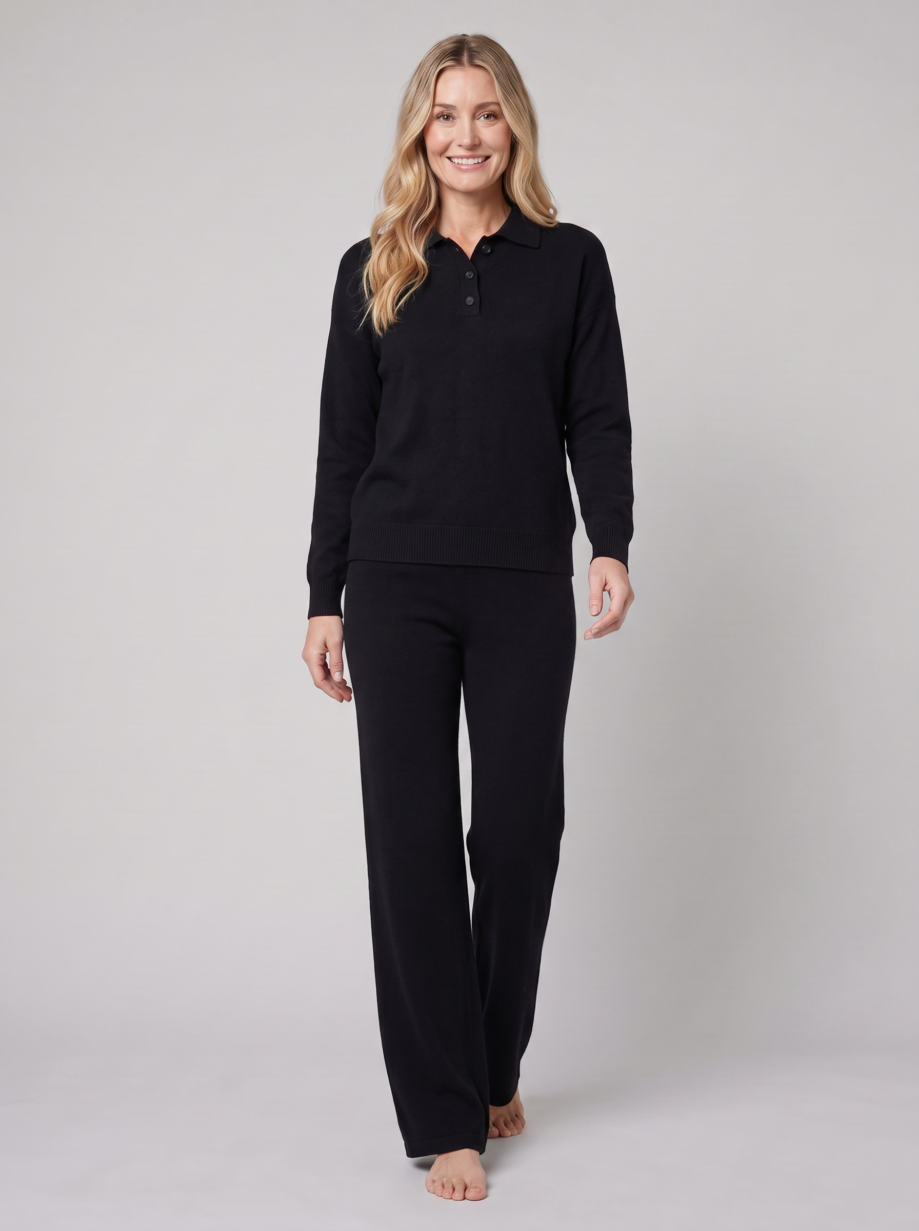Pamina polo knit sweater and wide-leg trouser set in black on model