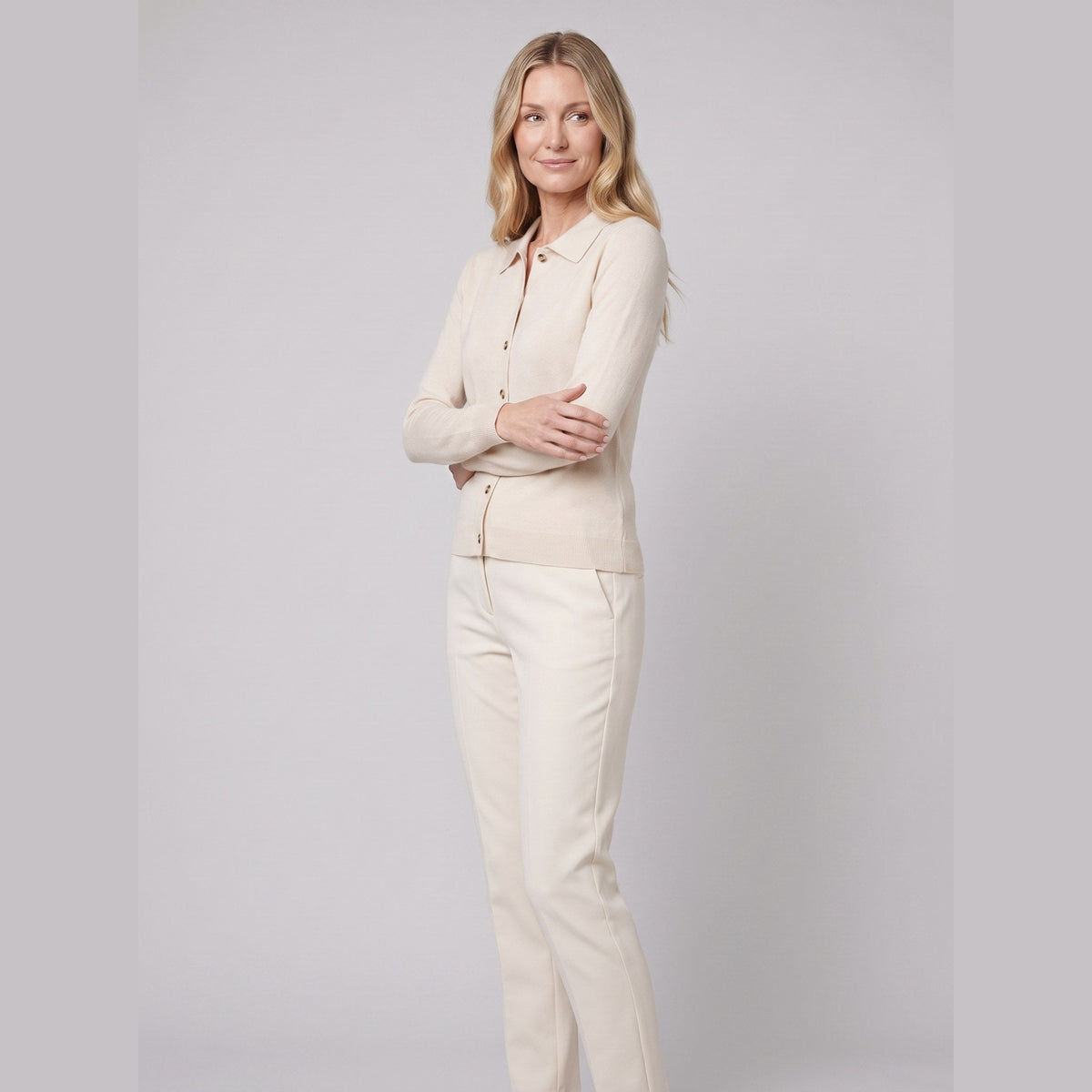 Romy wool-blend button cardigan in cream on model