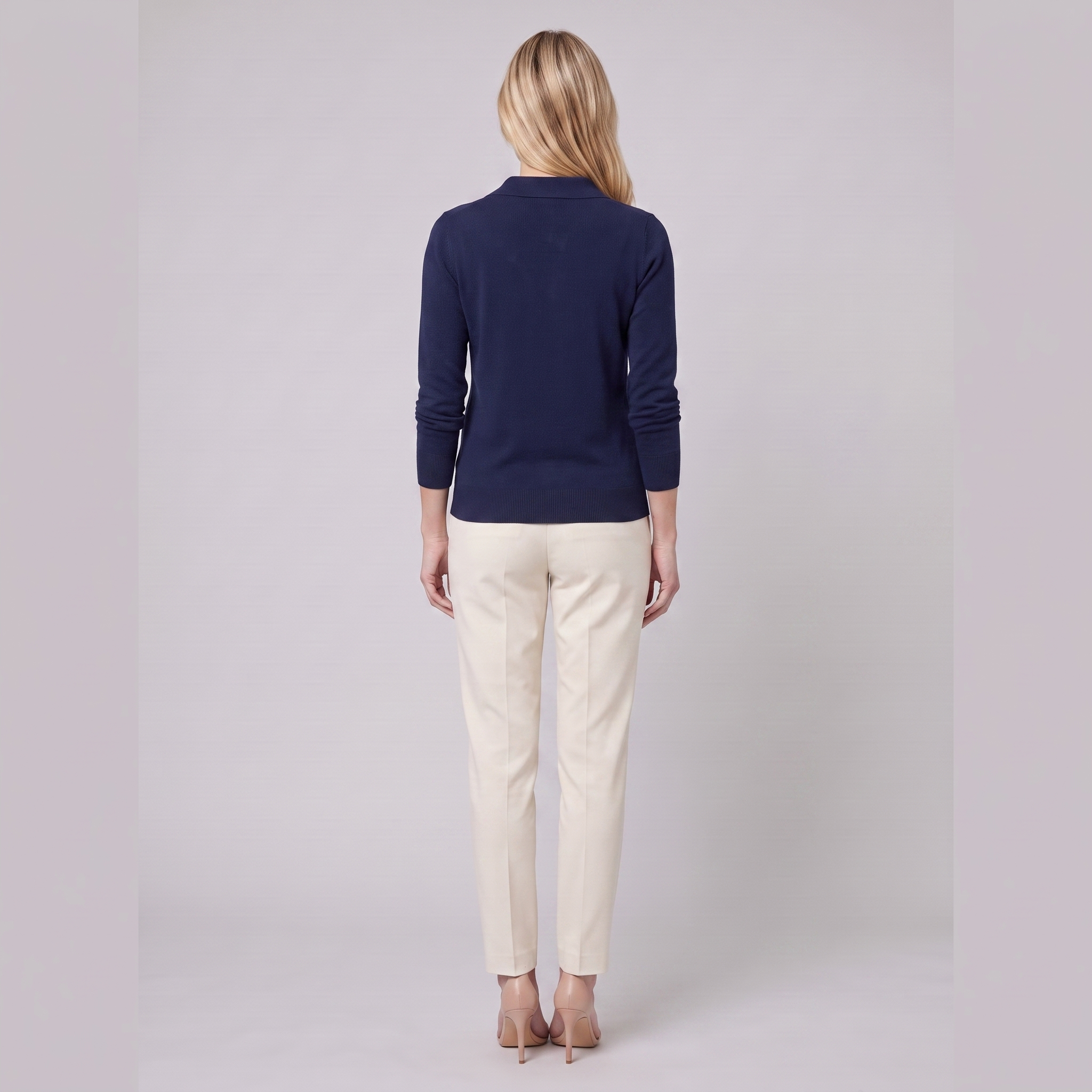 Romy knit cardigan in navy, back view on model