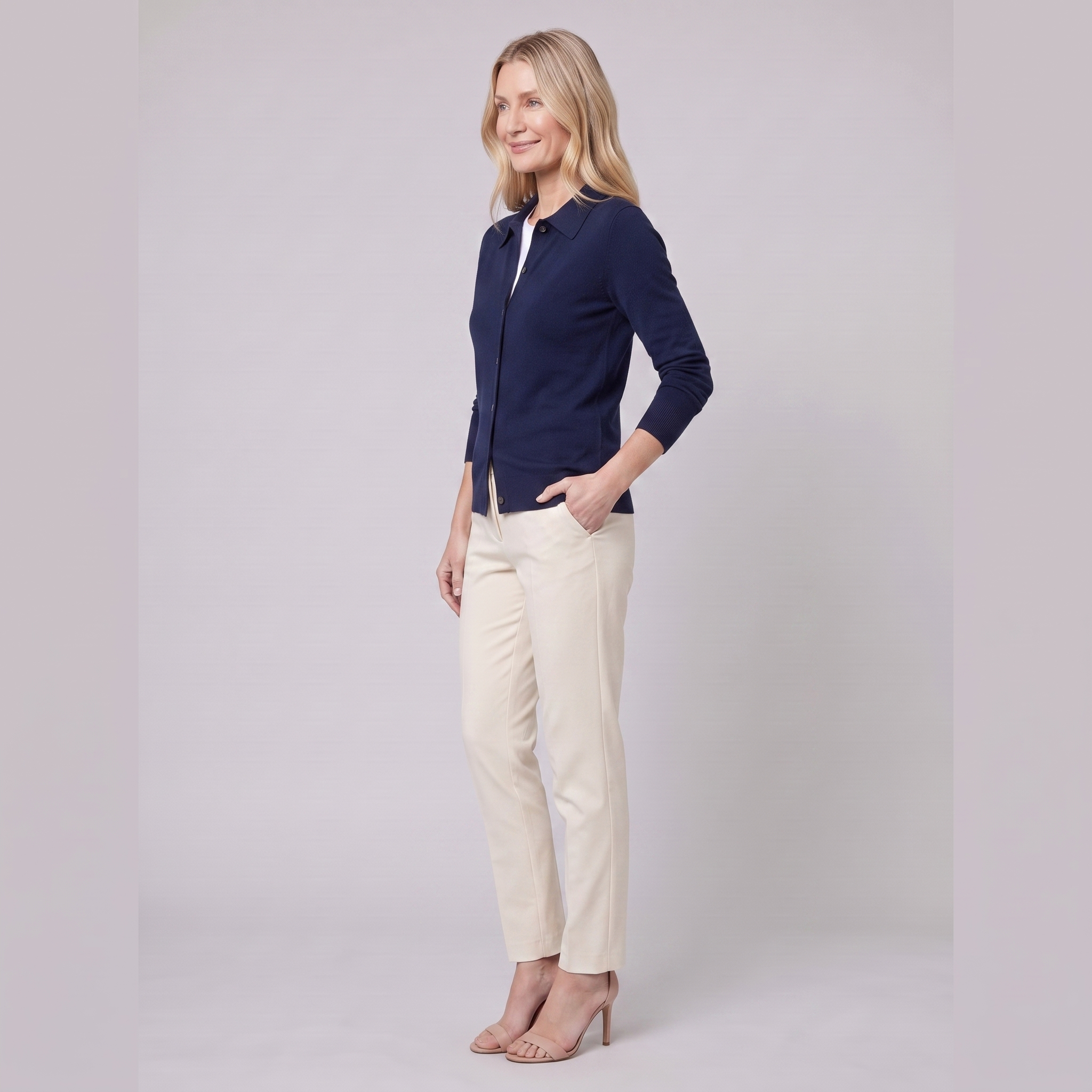 Romy knit cardigan in navy, side view on model