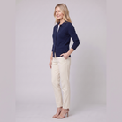 Romy knit cardigan in navy, side view on model