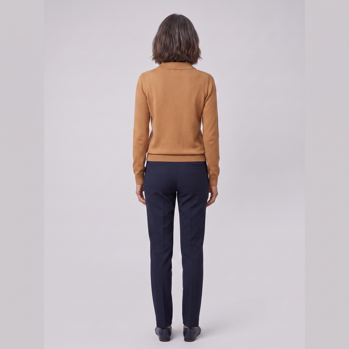 Rosalie knitted polo top in camel, back view on model