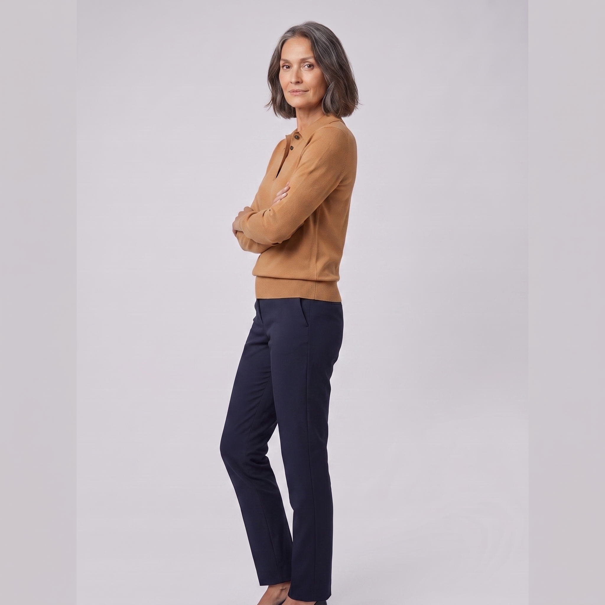 Rosalie knitted polo top in camel, side view on model