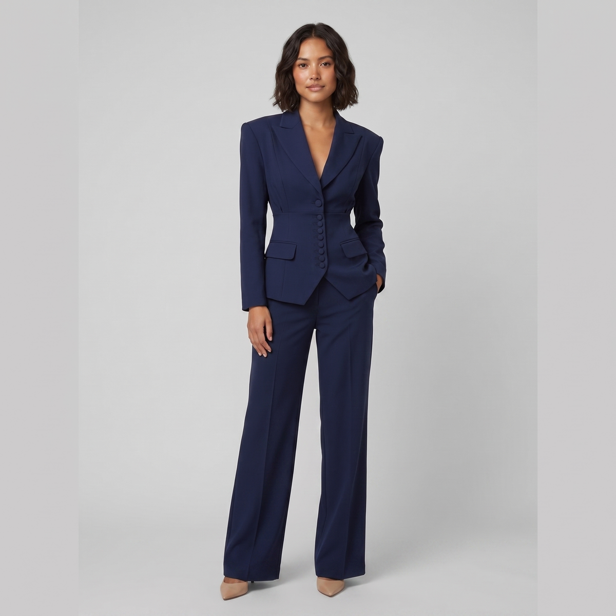 Wanda tailored peak lapel suit in navy blue on model