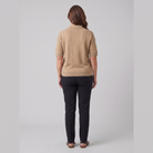 Willa knitted polo sweater in camel, back view on model
